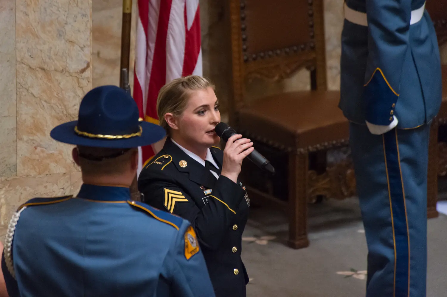 Tricia Scheer singing at the State of the State.
